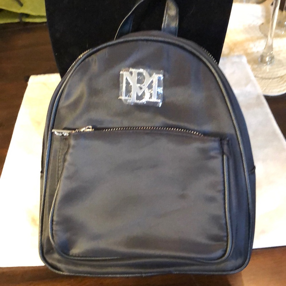Badgley Mischka Black Fabric & Vegan leather straps & loop outside pkt backpack